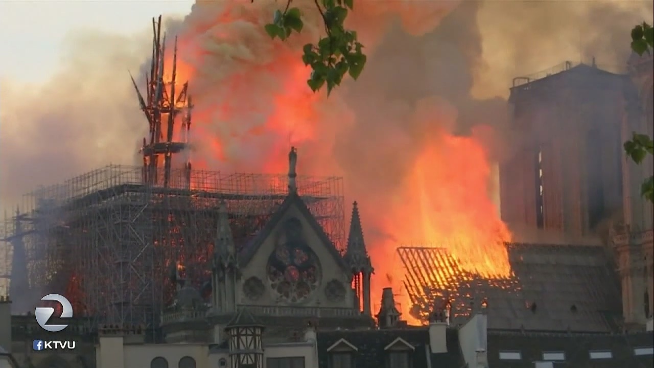 Firefighters are battling a massive blaze at the French capital's iconic Notre Dame Cathedral