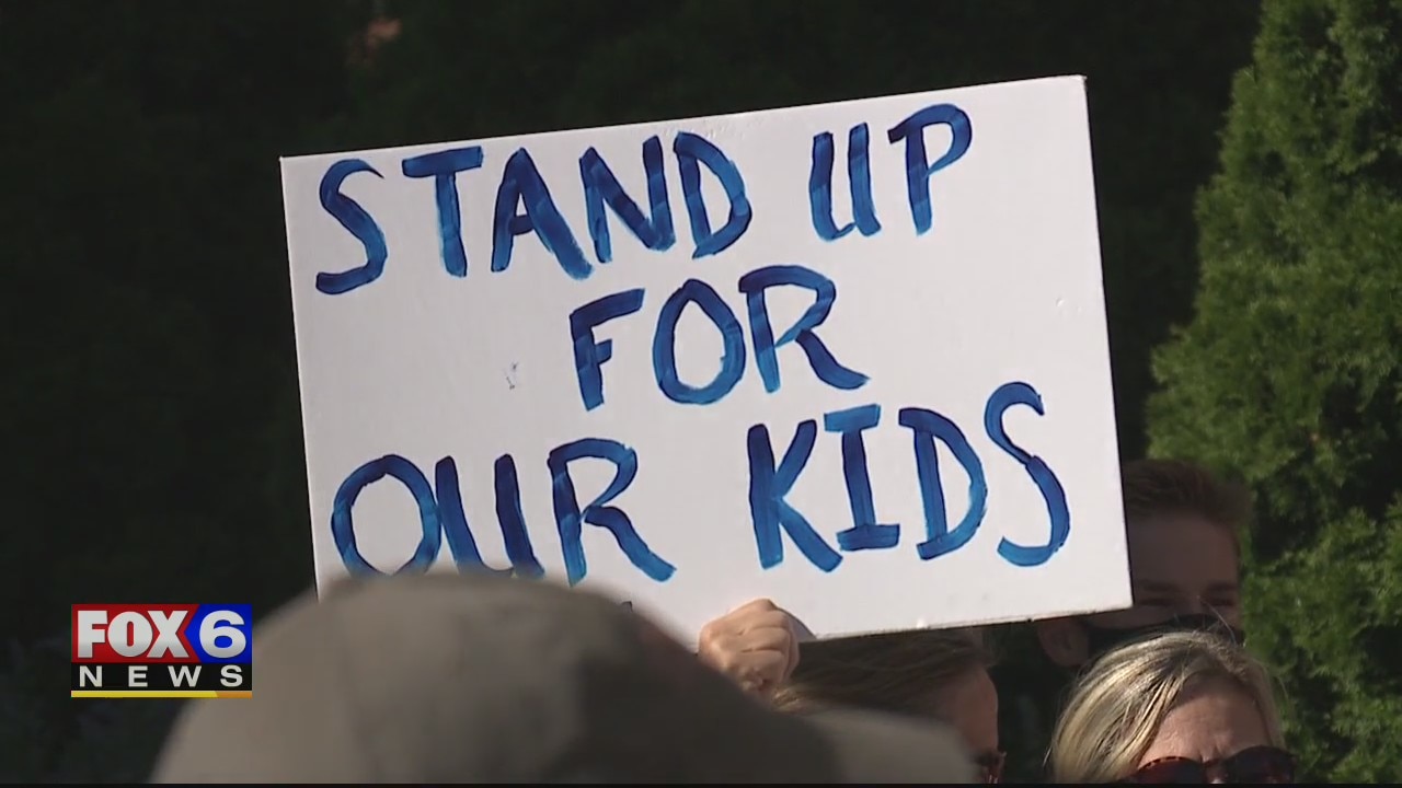 Students, parents of private schools protest outside City Hall