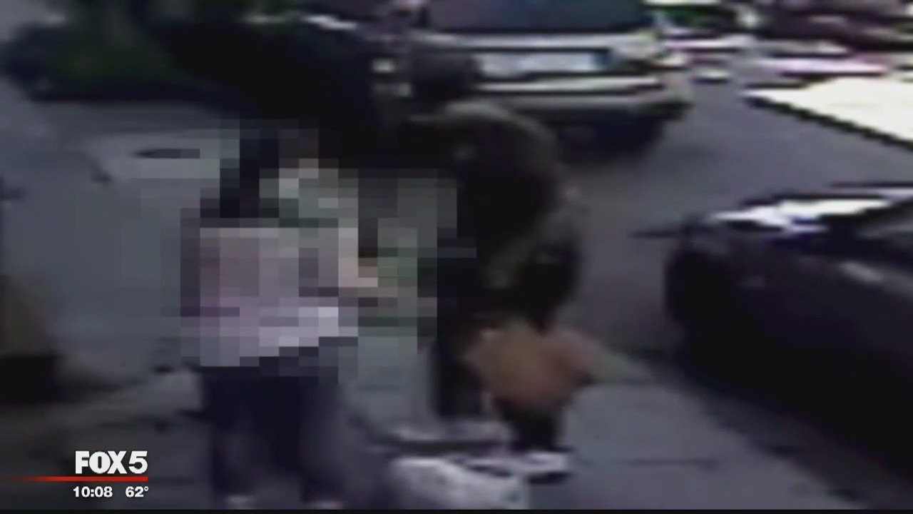 Mother with young child nearby robbed at gunpoint in DC