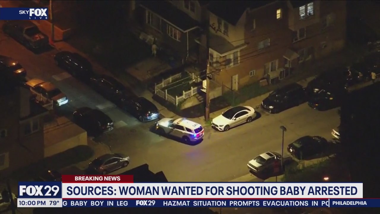 Woman in custody after shooting injures baby, sources say