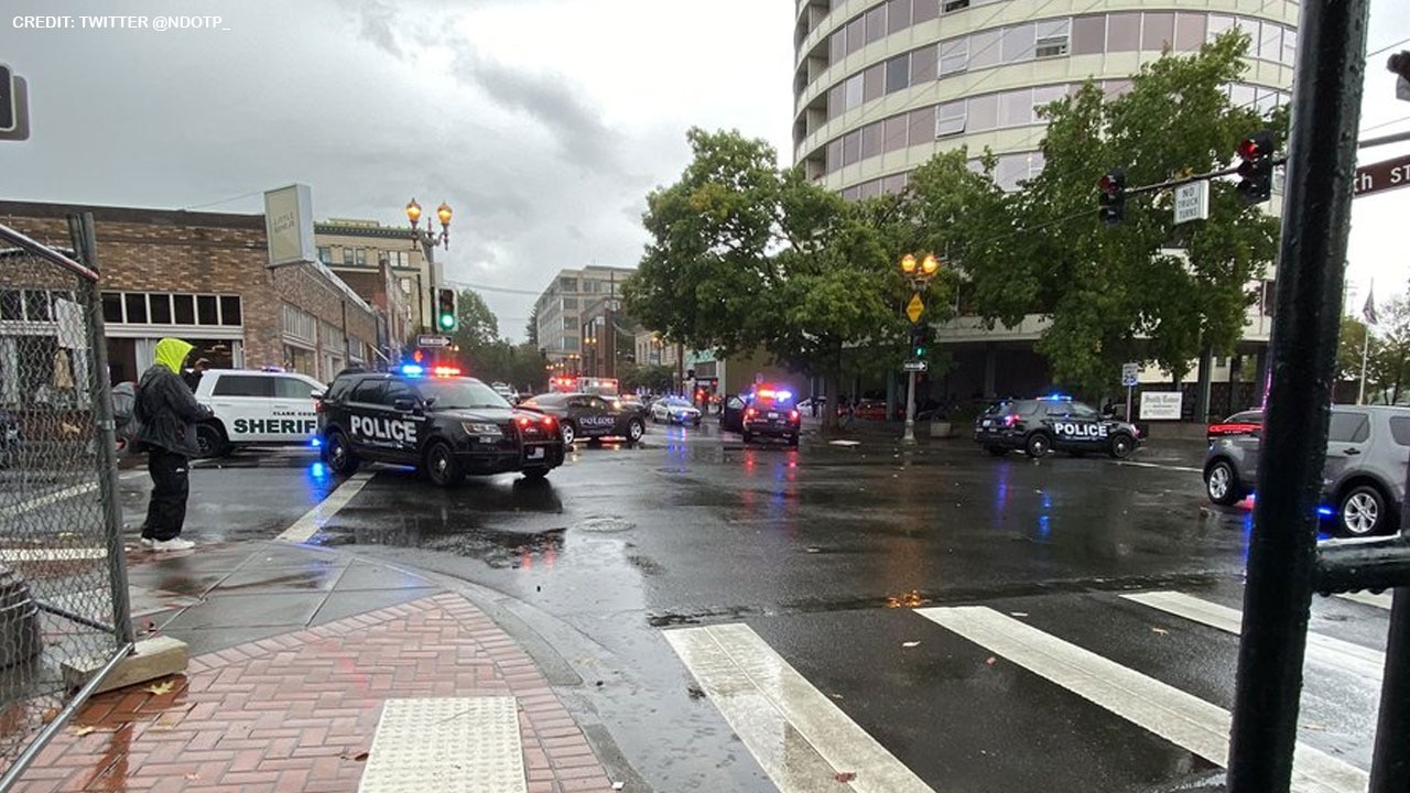1 killed, suspect in custody following shooting at Washington apartment