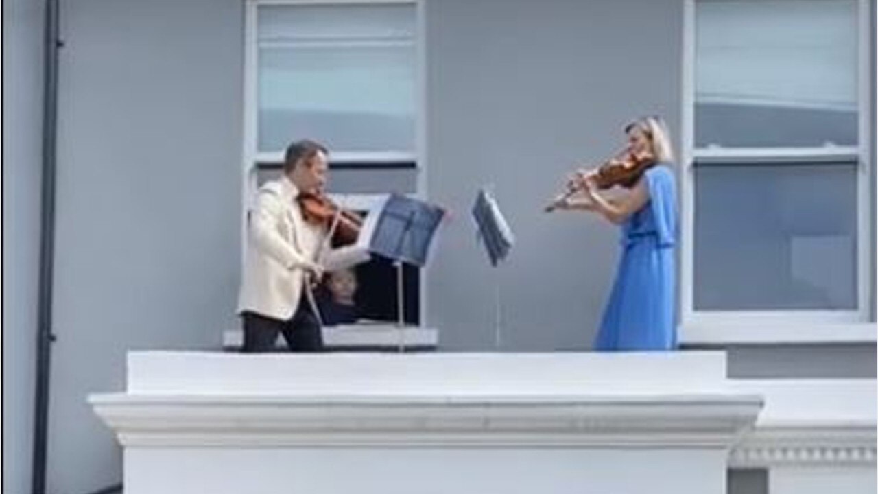 UK couple puts on violin concert for neighborhood on COVID-19 lockdown
