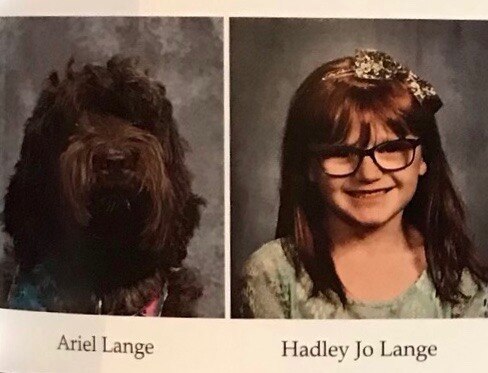 Girl surprised with service dog photo in yearbook