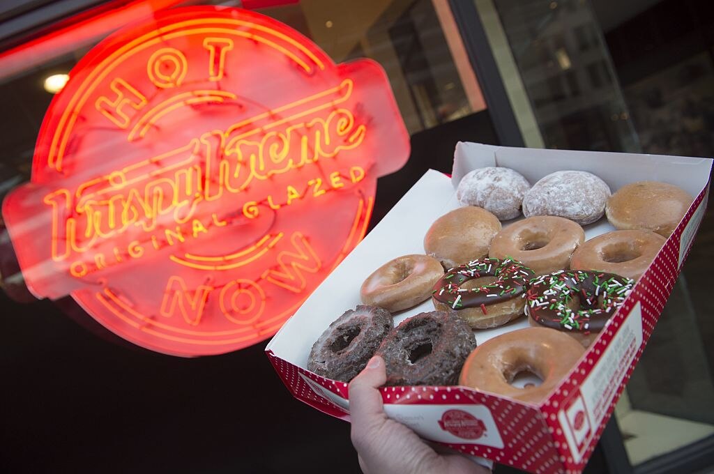Giant line forms outside Krispy Kreme shop reopening