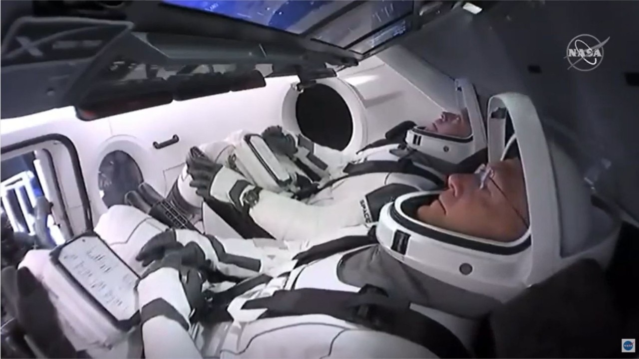 Meet the two astronauts who will pilot SpaceX's Crew Dragon