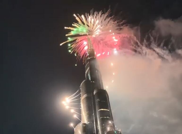 Burj Khalifa lit up by fireworks just after midnight on January 1, 2021