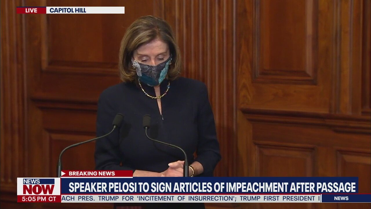 Pelosi signs article of impeachment after passage