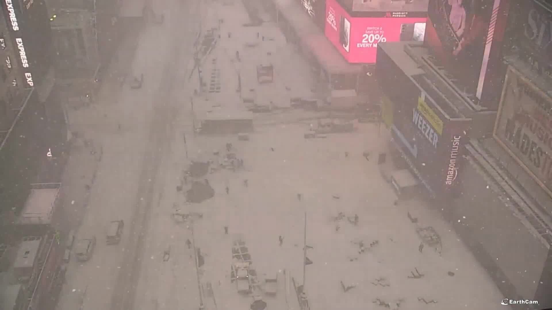 Times Square EarthCam shows New Yorkers trudging through heavy snowfall