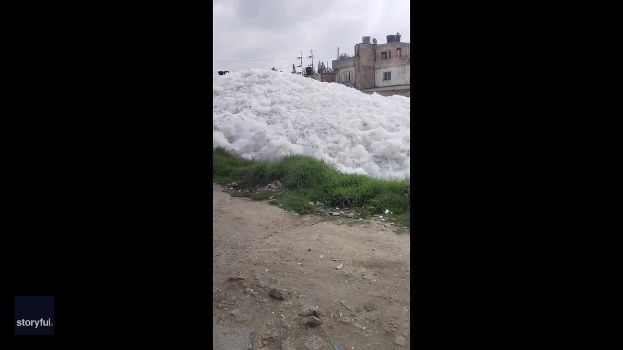 Polluted foam forms along river near Colombian capital