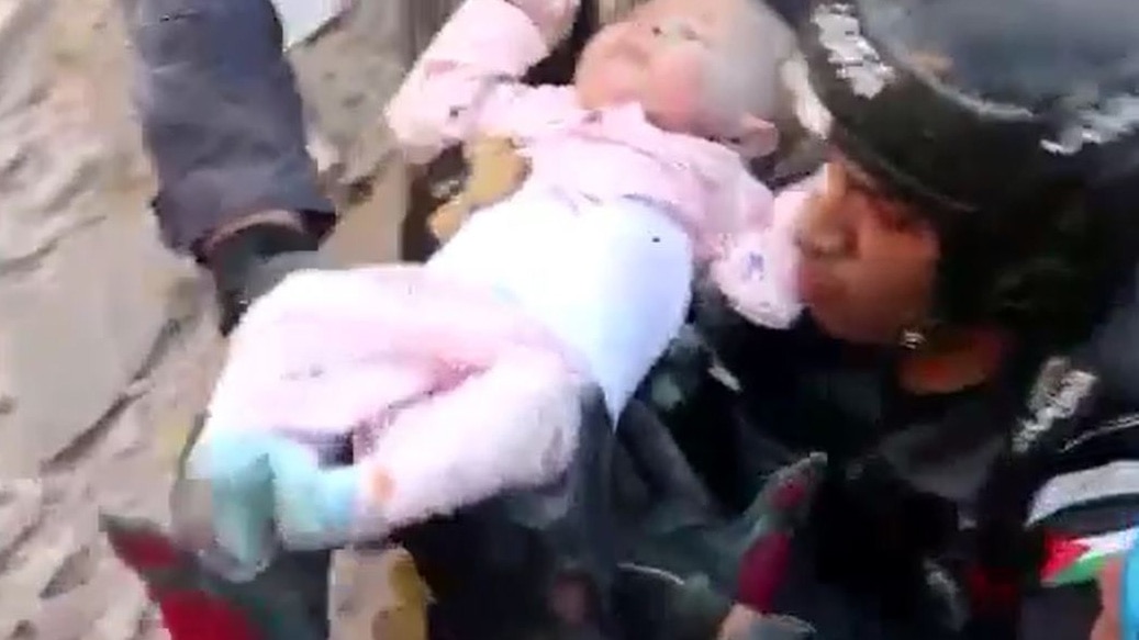 Baby rescued from rubble after building collapse