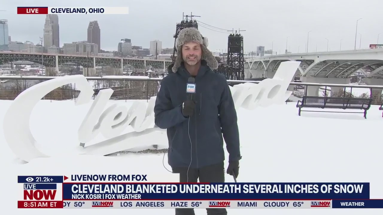 Cleveland plowed by several inches of snow