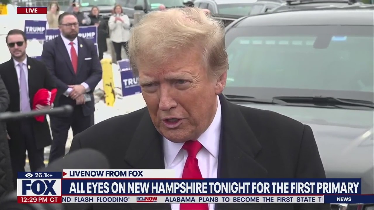 Trump makes surprise stop at NH polling spot