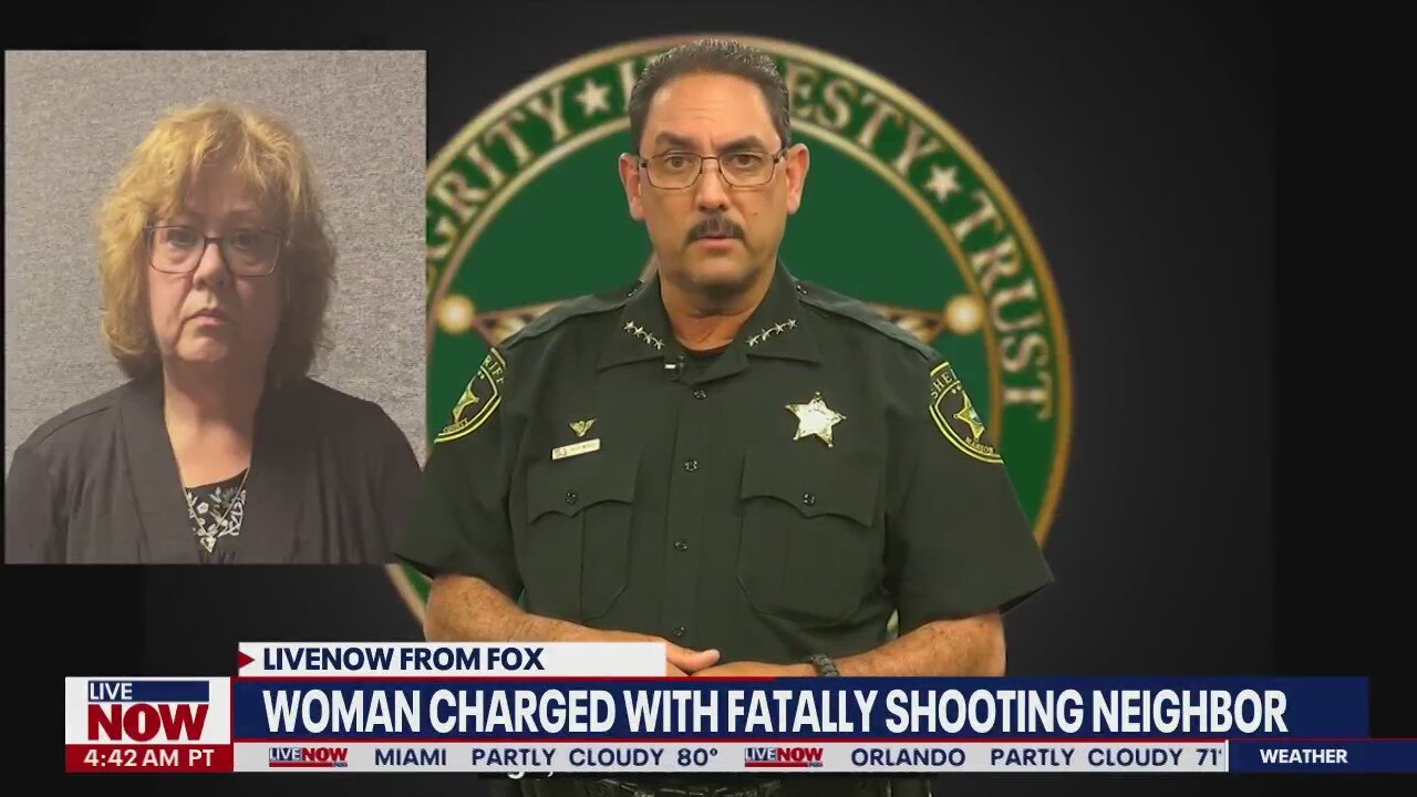 Woman charged with fatally shooting neighbor