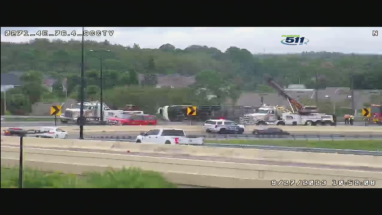 Truck hauling rocks overturns on Florida ramp