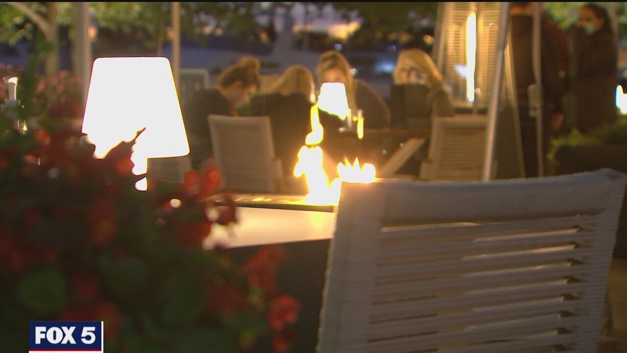 People braving cooler temperatures to dine outside