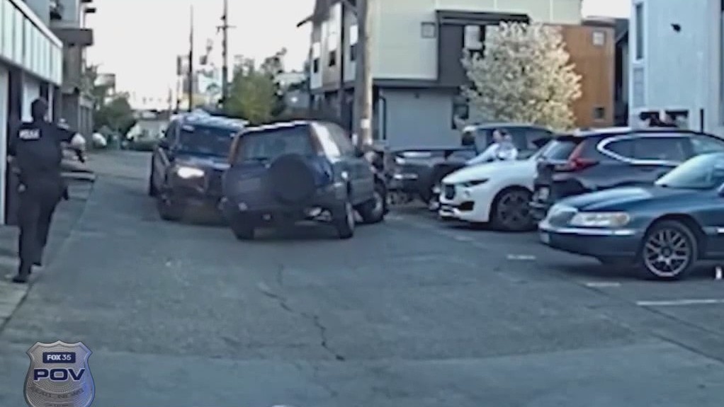 Driver runs another car over during chase