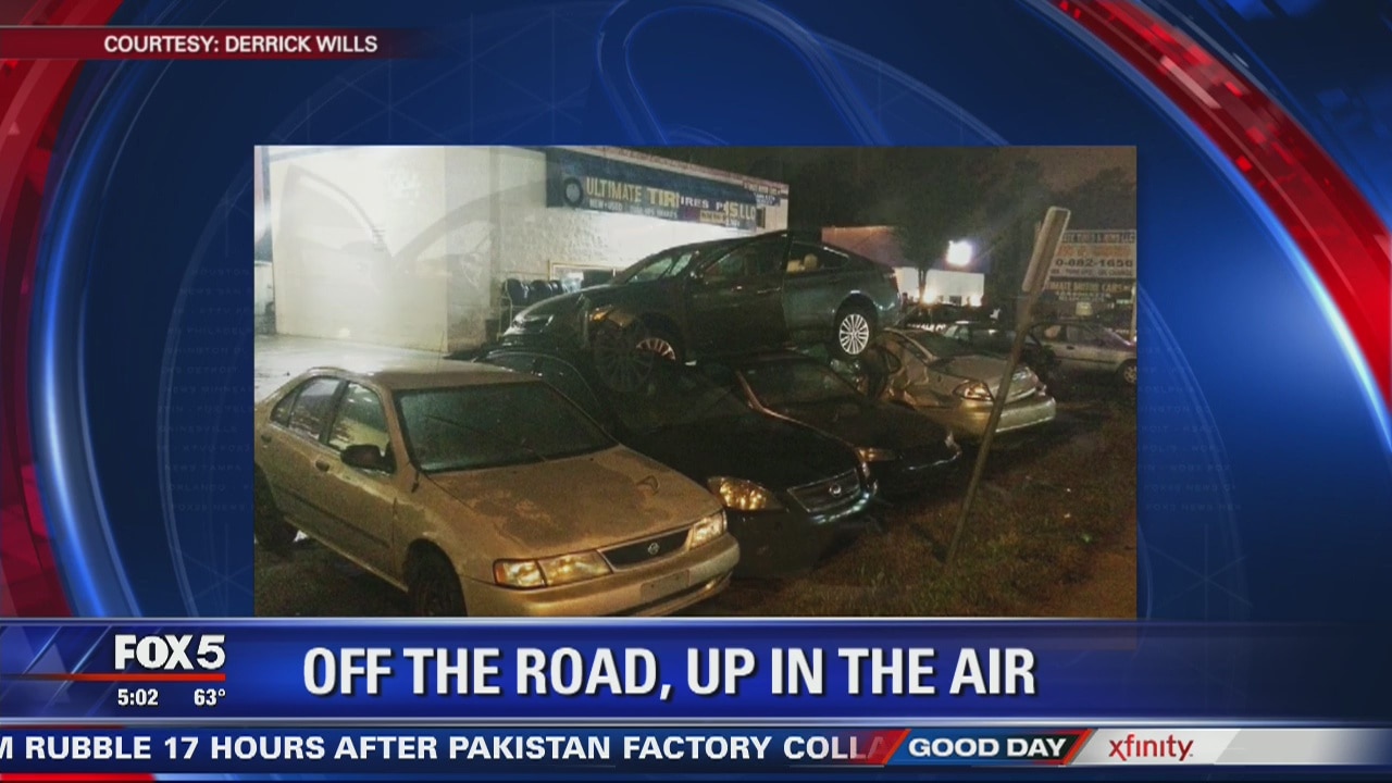 Car Lands on Three Cars