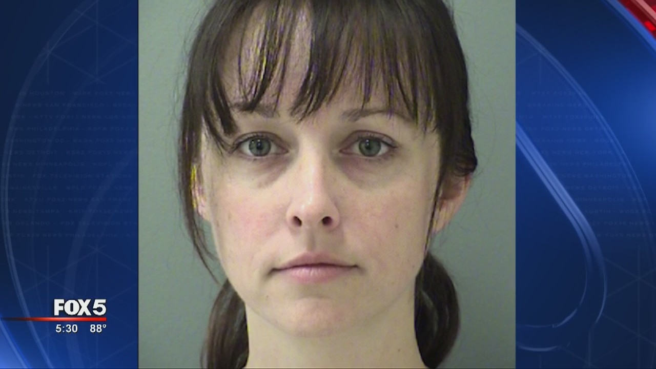 Cherokee ex-teacher arrested