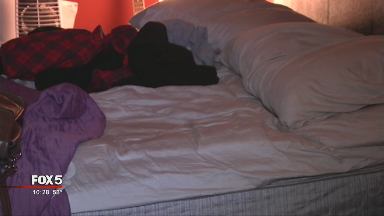 Burglar loomed over sleeping victim