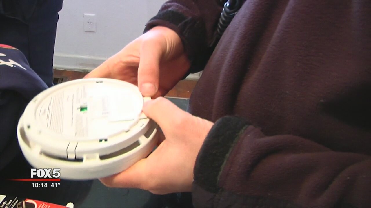 Firefighters out installing alarms