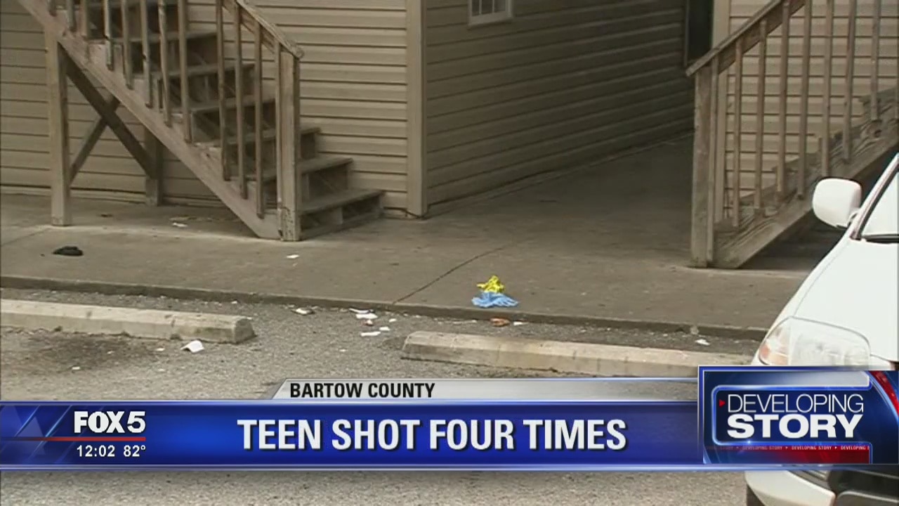 Teen shot four times