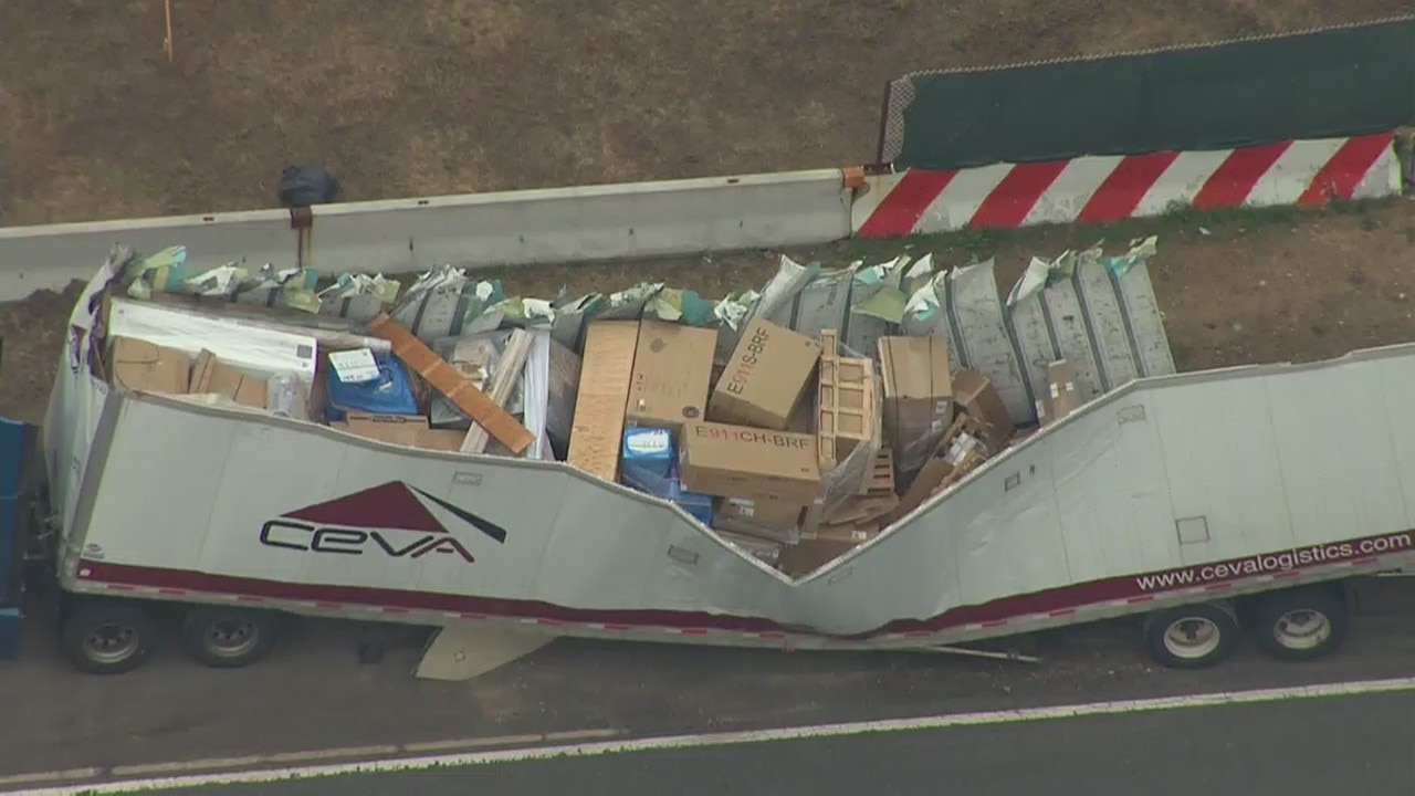 Truck hits overpass in Brooklyn