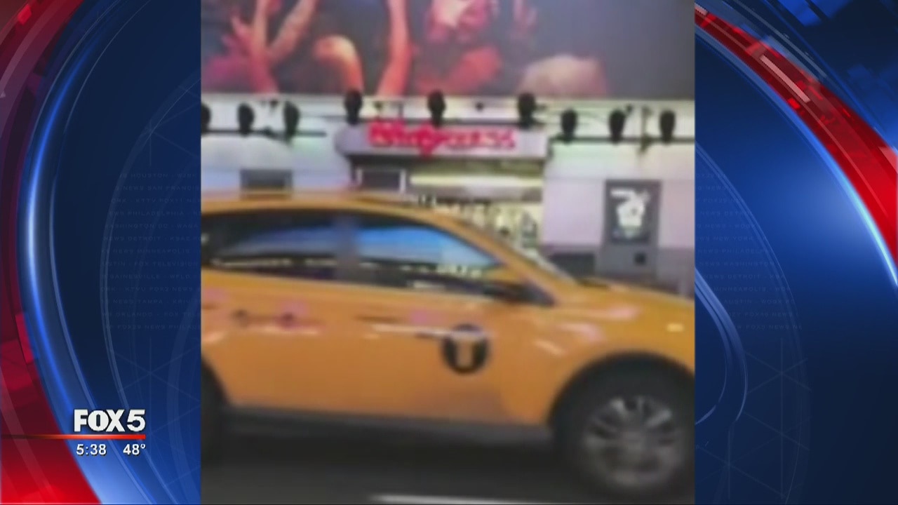 NYPD officer nearly hit by car