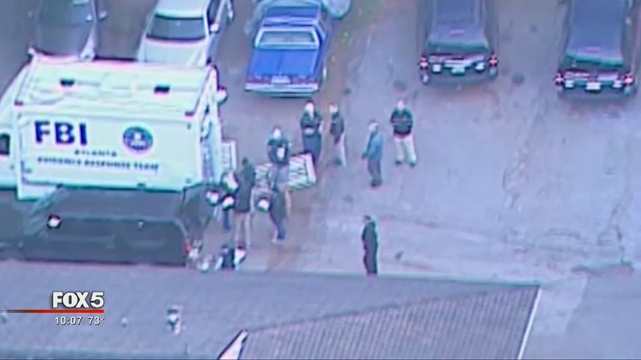 Feds raid rapper's home