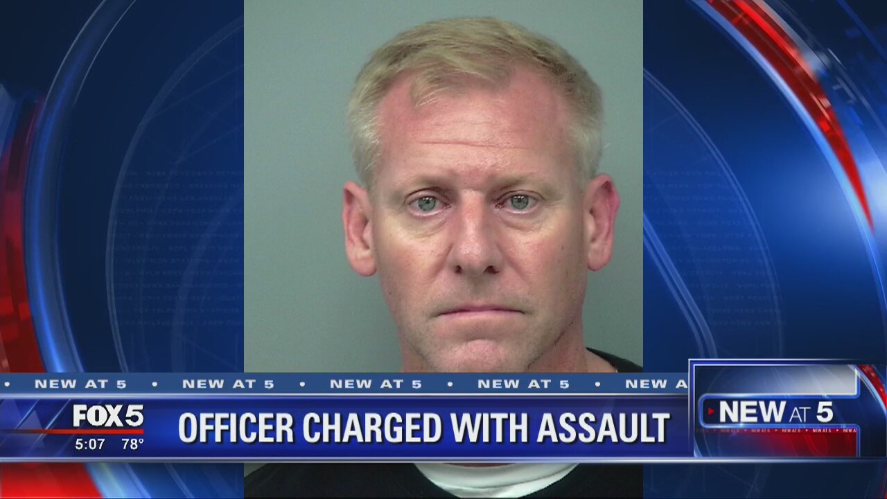 Officer charged with assault