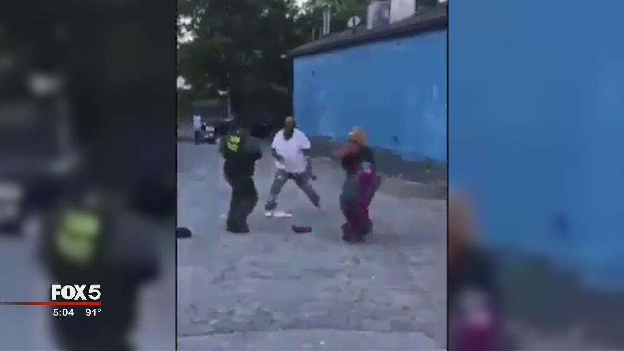 New video shows APD officer and suspect engaged in physical altercation