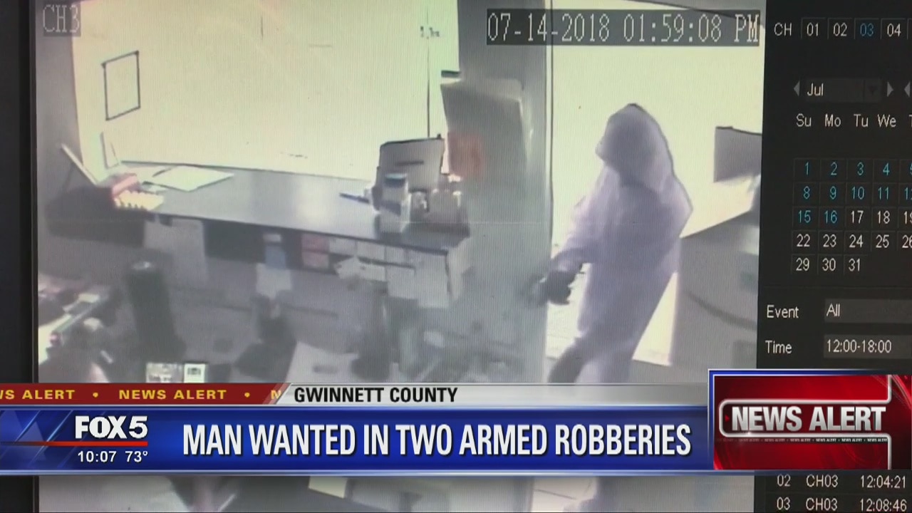 Man wanted in two armed robberies