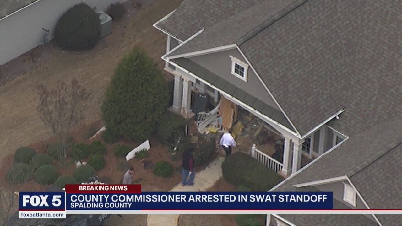 County commissioner arrested by SWAT team