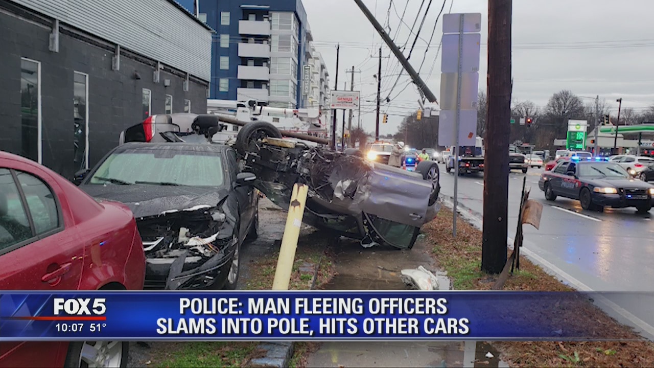 Police: Man fleeing officers slams into pole, hits other cars