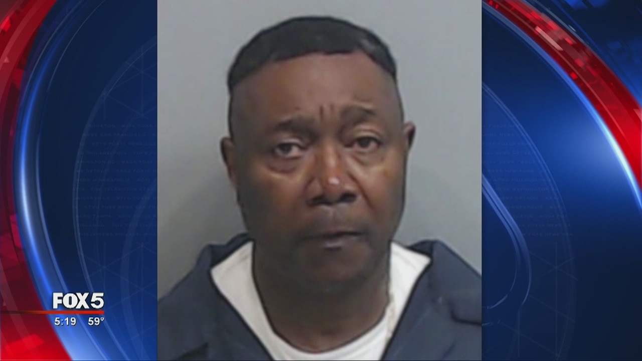 Man in custody after woman killed in bank parking lot