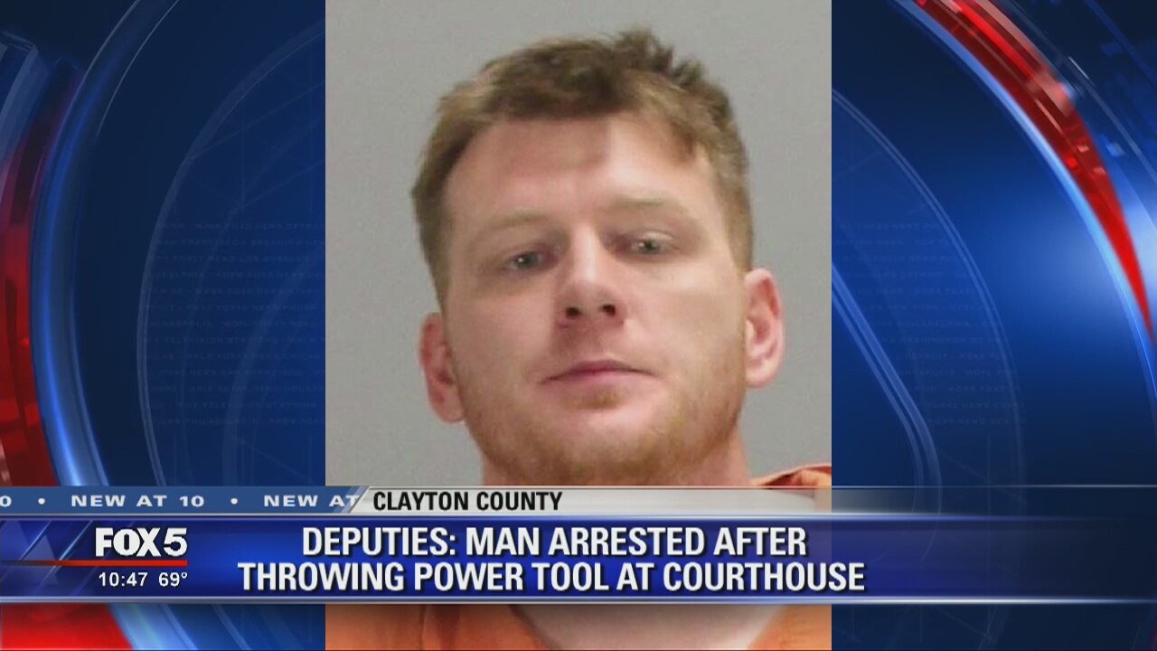 Deputies say man arrested for throwing power tool at courthouse