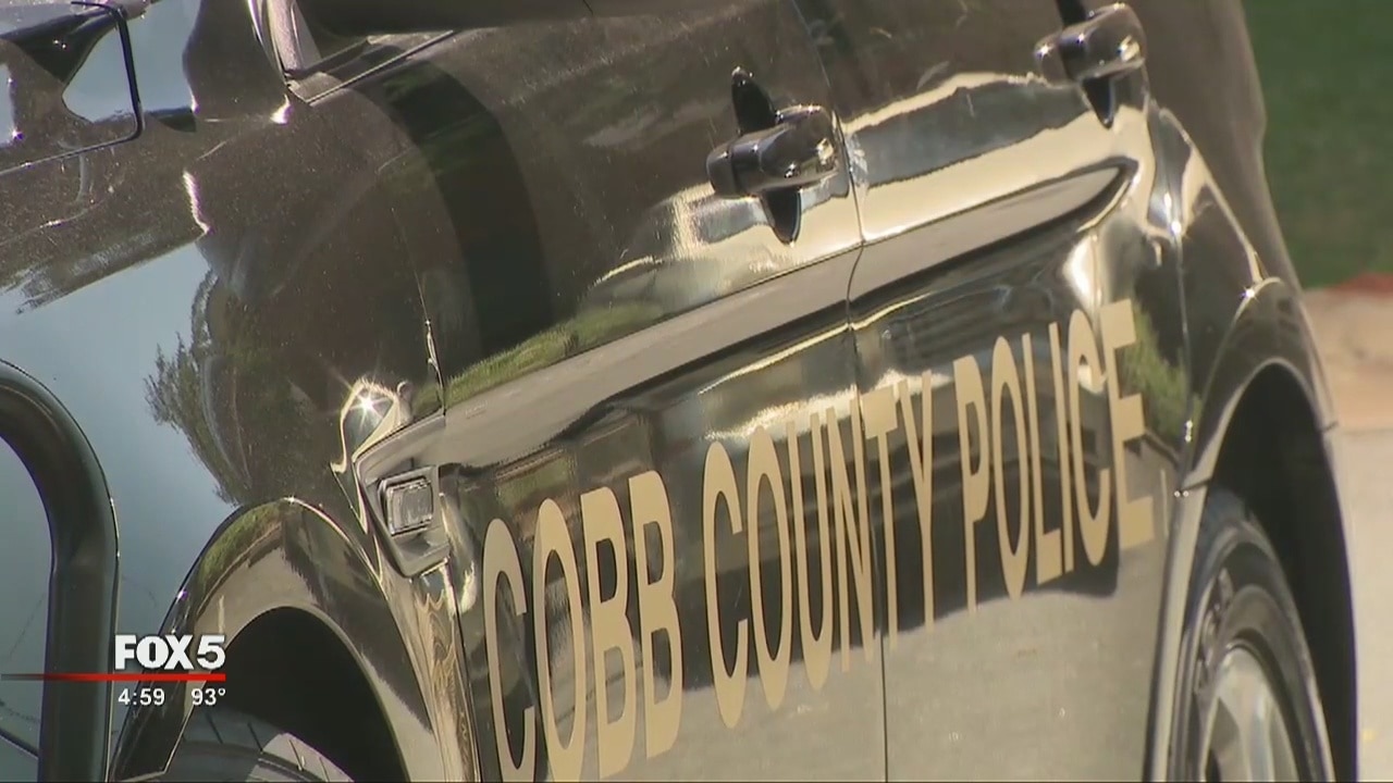 Woman found murdered in her car