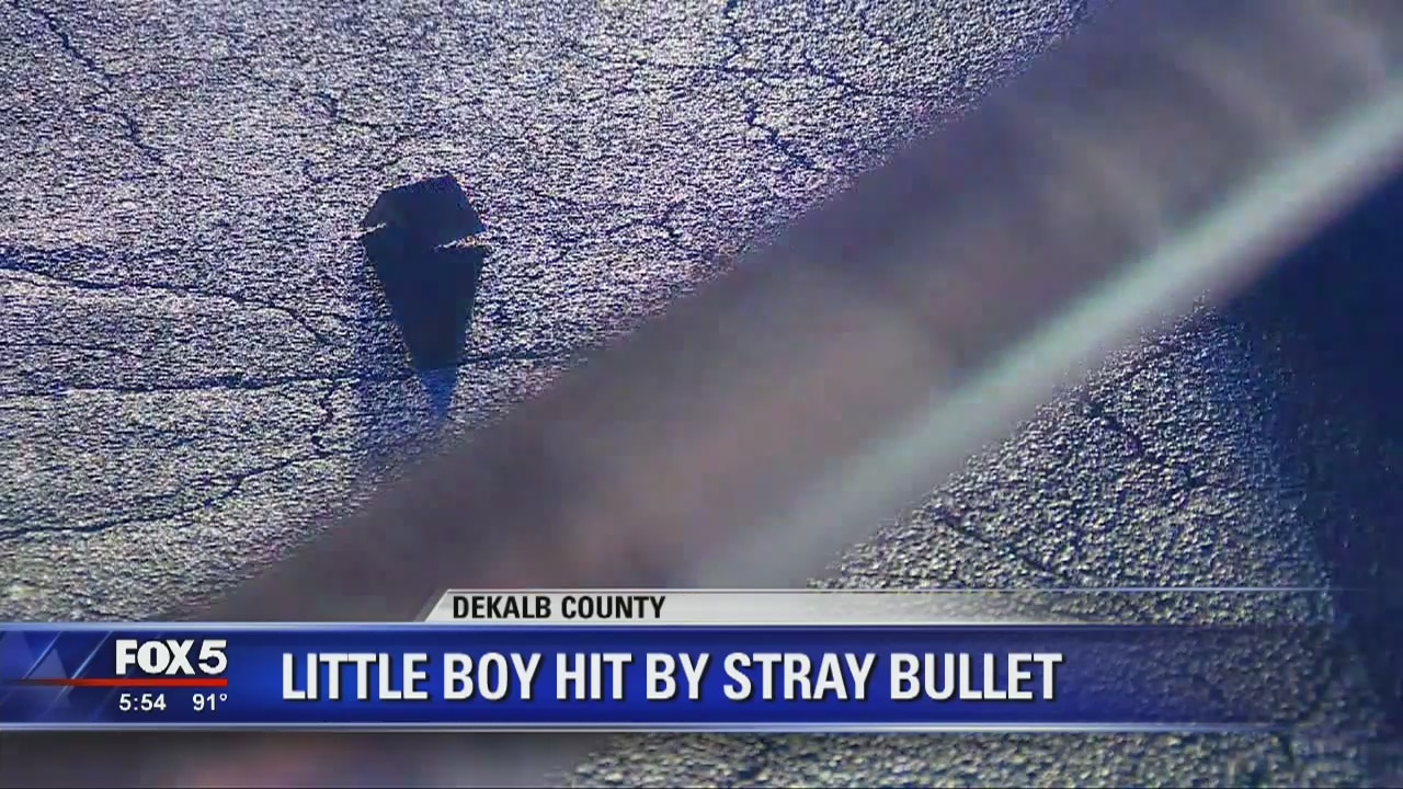 Little boy hit by stray bullet