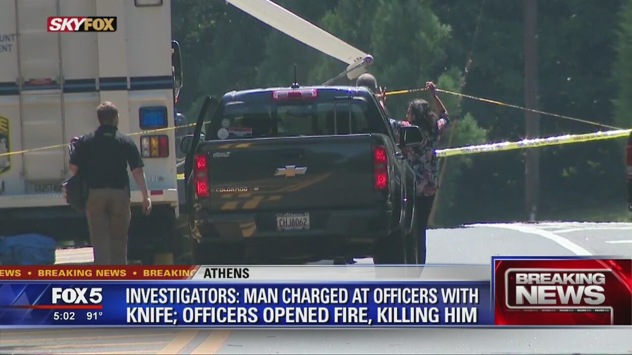 Knife wielding suspect shot by officers