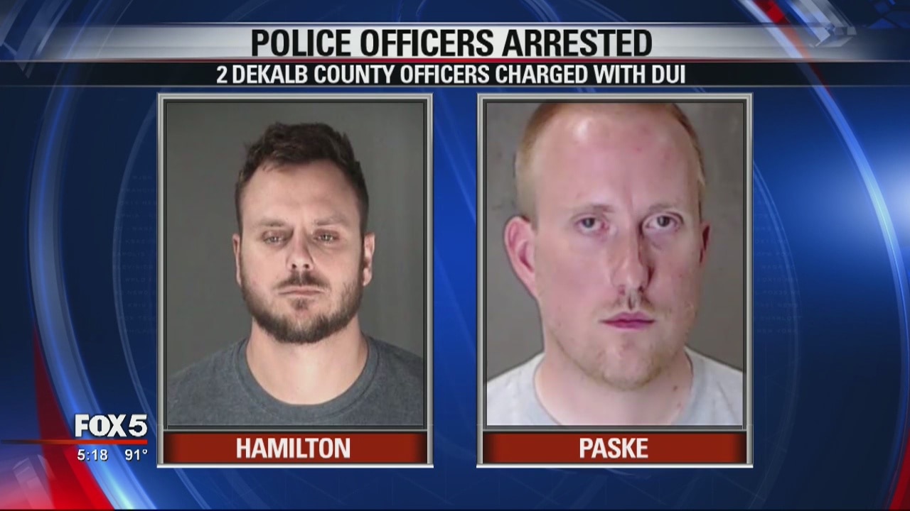 Two Officers arrested and charged with DUI