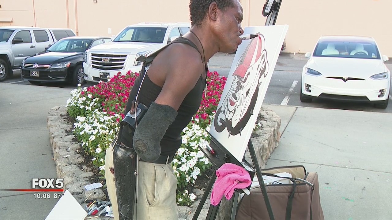 Police: Athens artist with no hands attacked