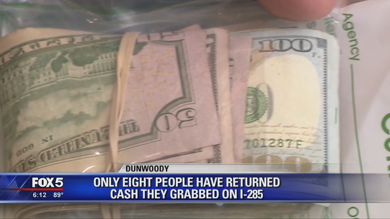Only eight people have returned cash they grabbed on I-285