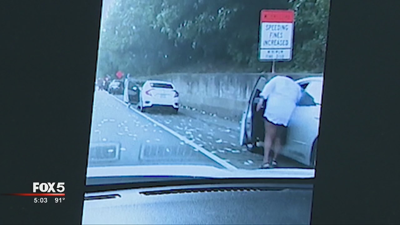 Cash spilled on highway