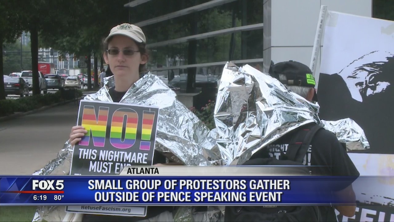 Small group of protesters gathered outside of Pence speaking event