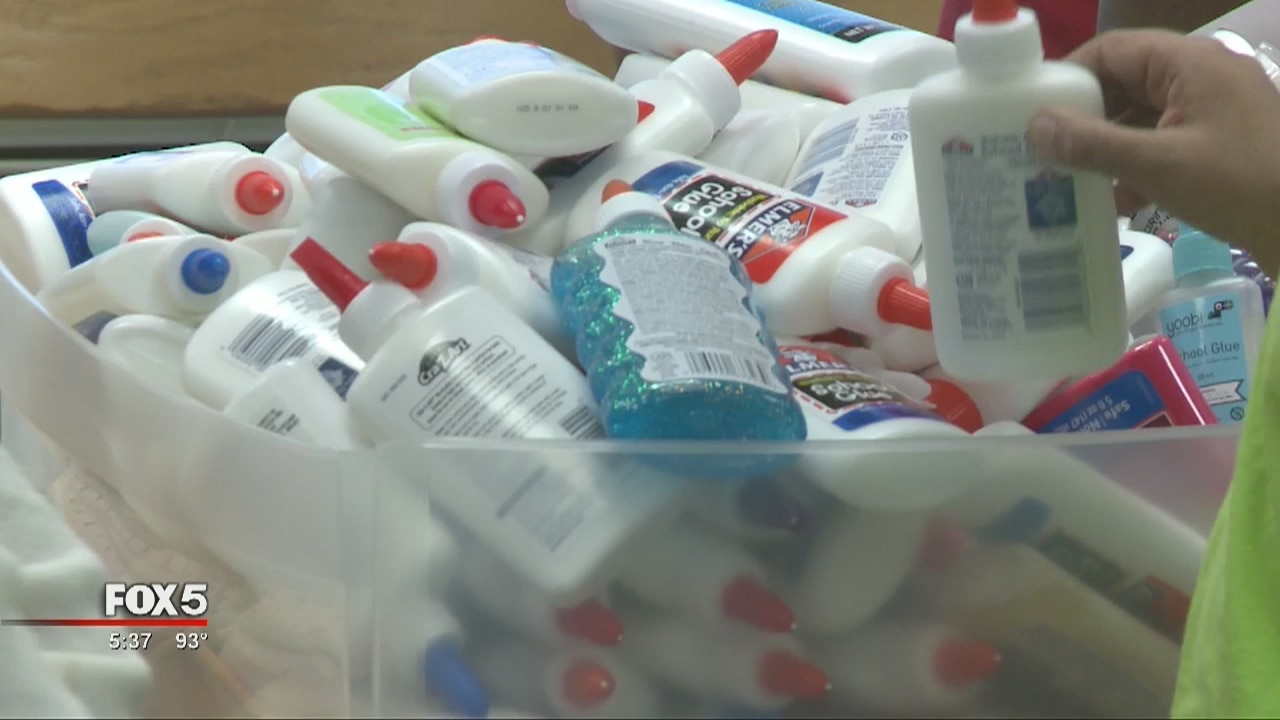 Children receive school supplies