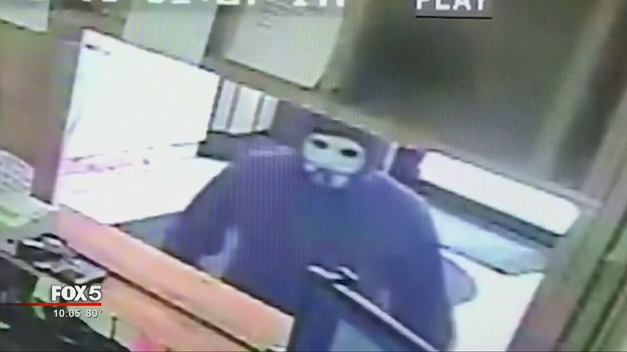 Pawn shop owner escapes masked gunman