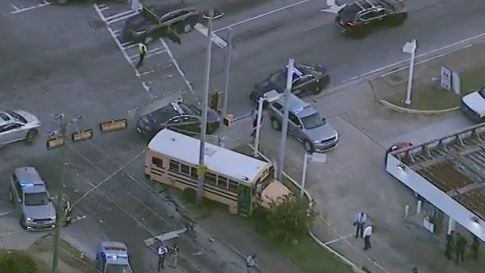 Suspected car thieves crash into school bus
