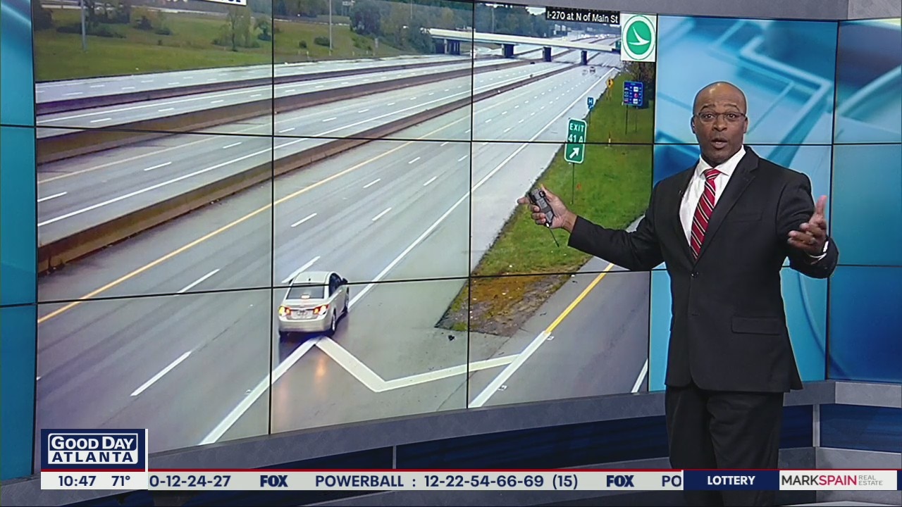 Driver caught on camera reversing on interstate