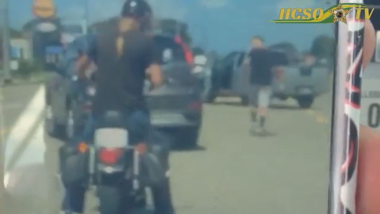 Road rage suspect steals necklace