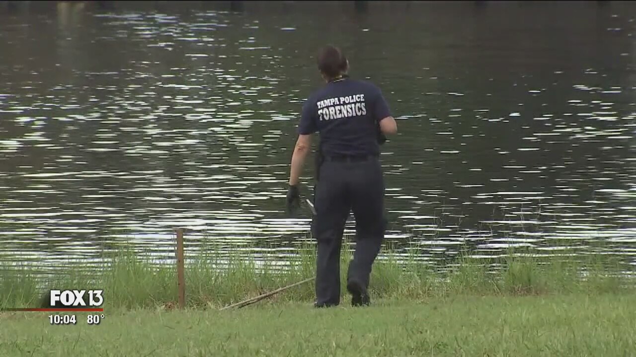 Child dies after being thrown into river