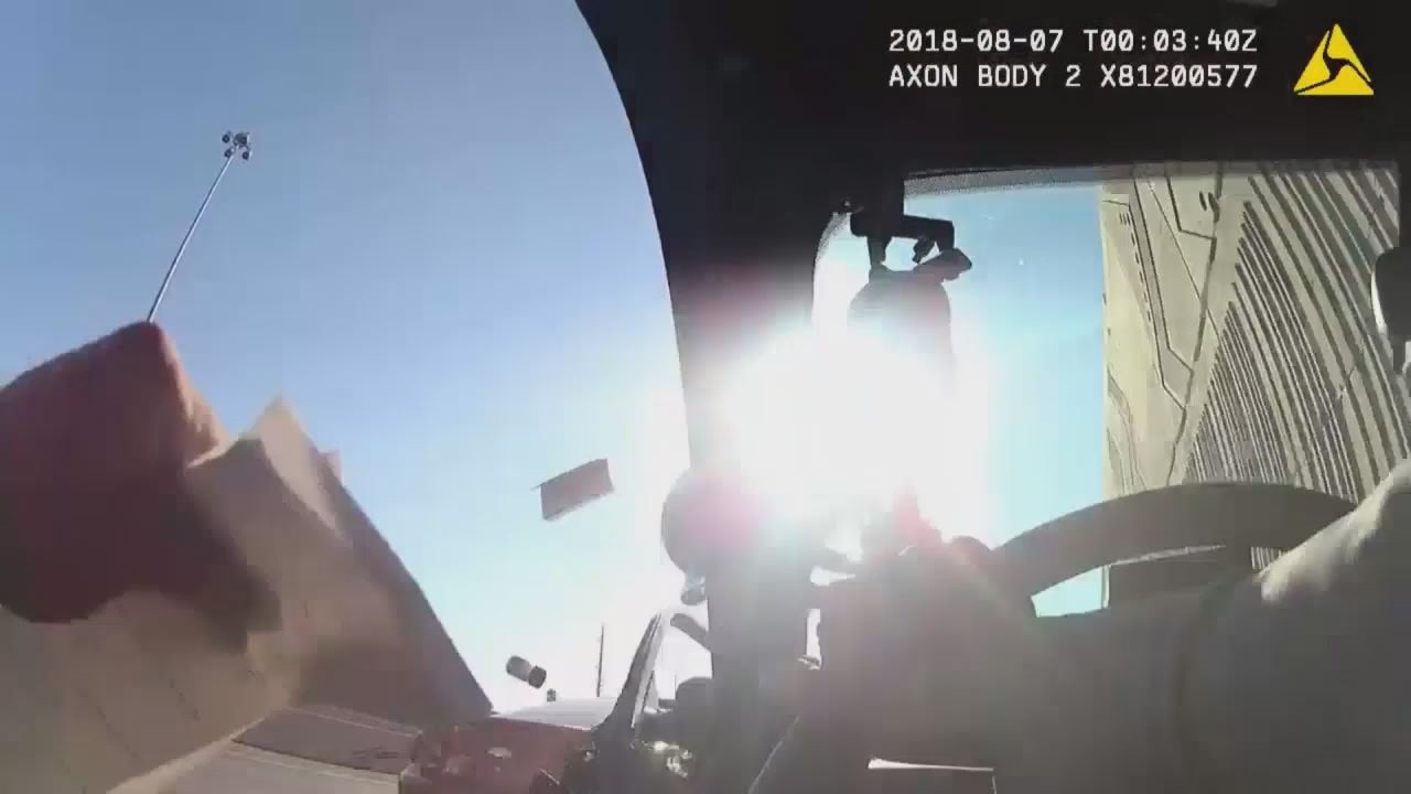 Watch: Car slams into trooper's car door